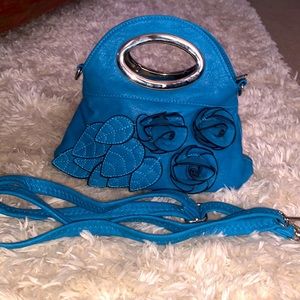 Brand new, never used, cerulean blue purse